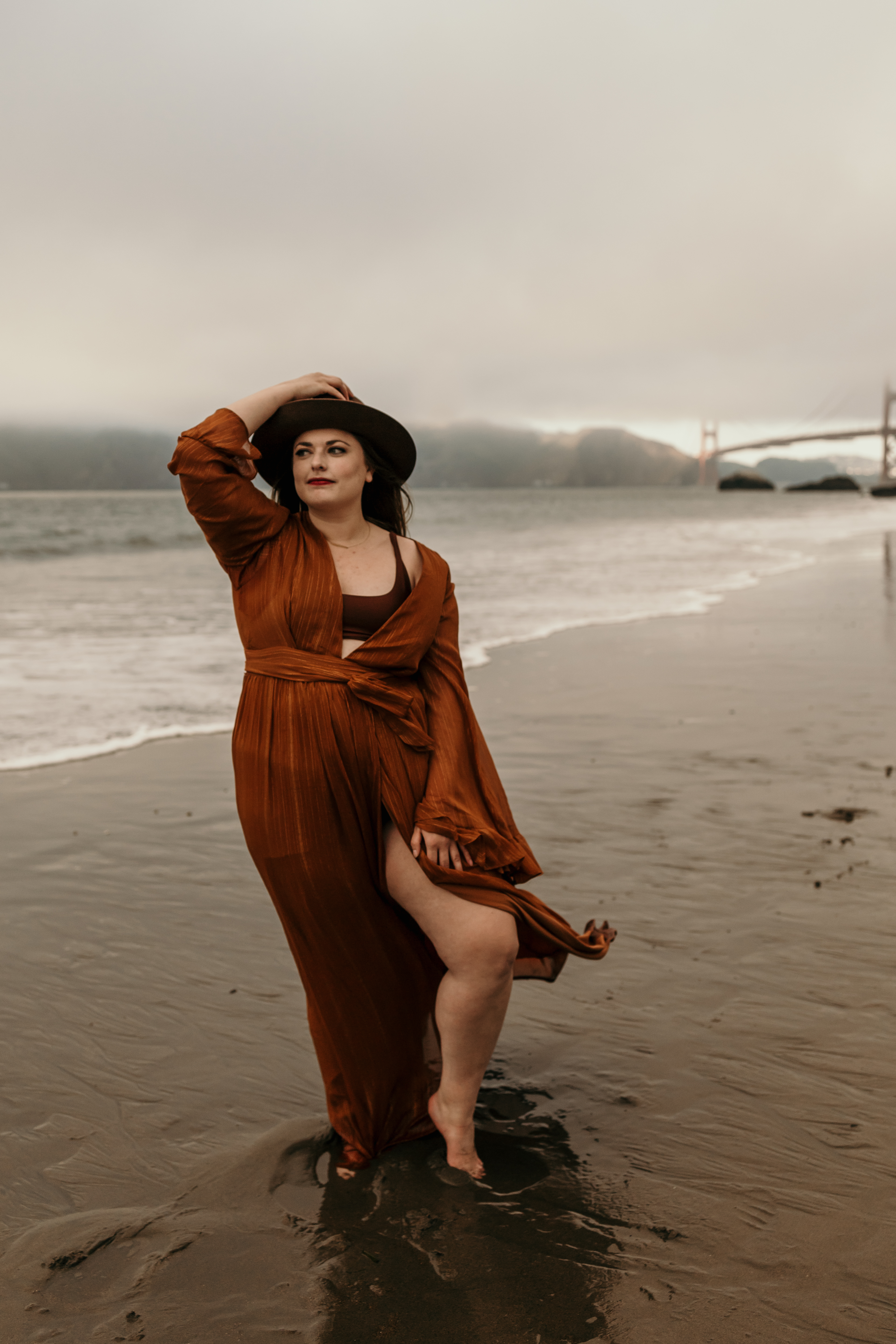woman on Baker beach in San Fran, CA