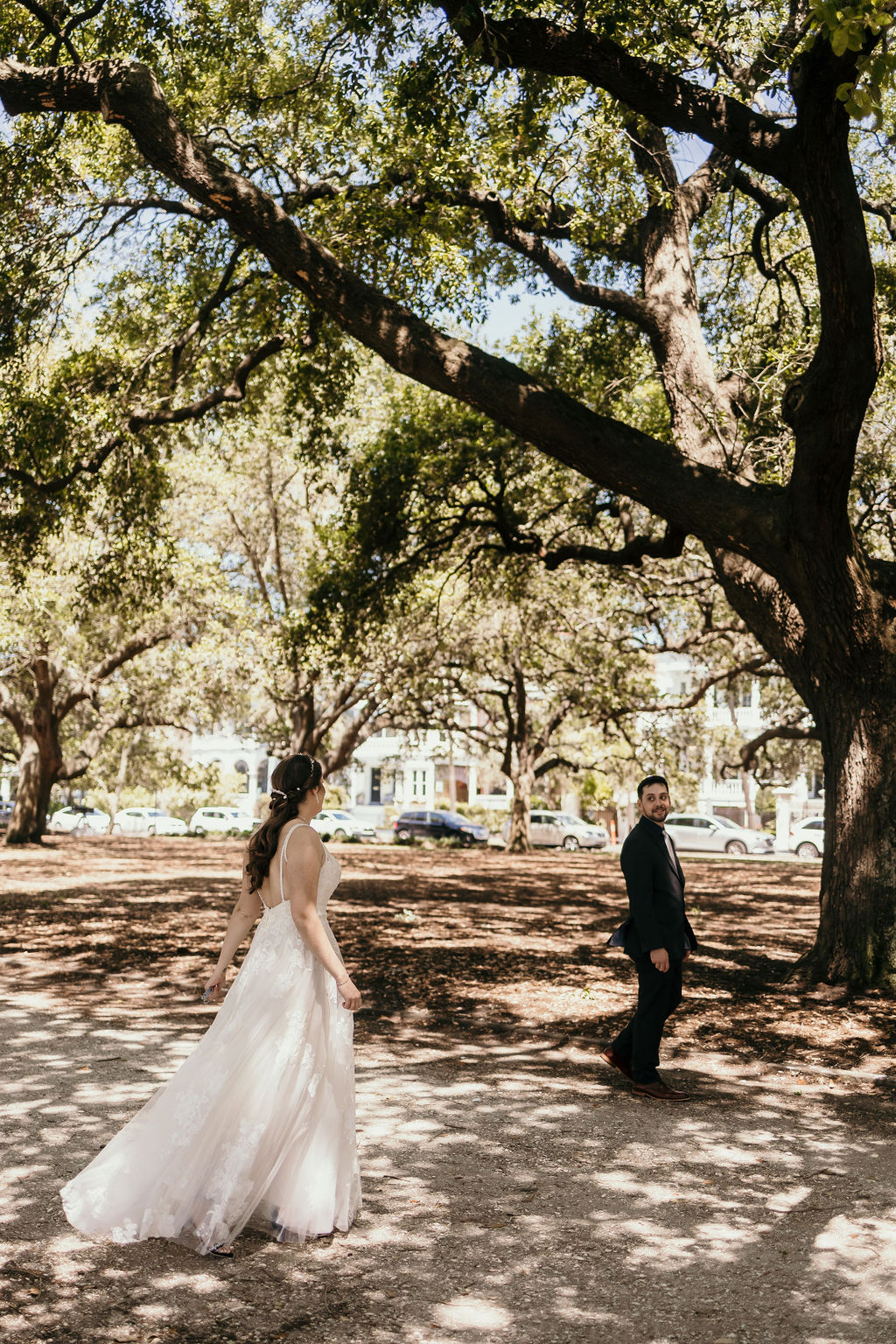 first look in downtown charleston, sc with couple getting married at white point garden