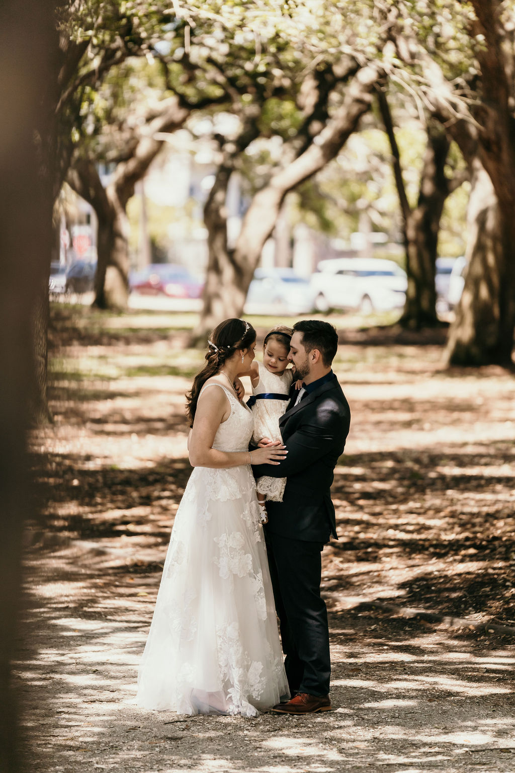 couple at their wedding ceremony located at white point garden in charleston, sc.